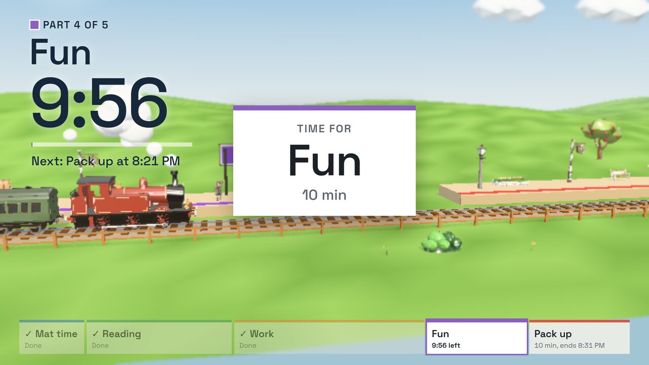 The train has reached the Fun station and a card says Time for Fun, 10 min